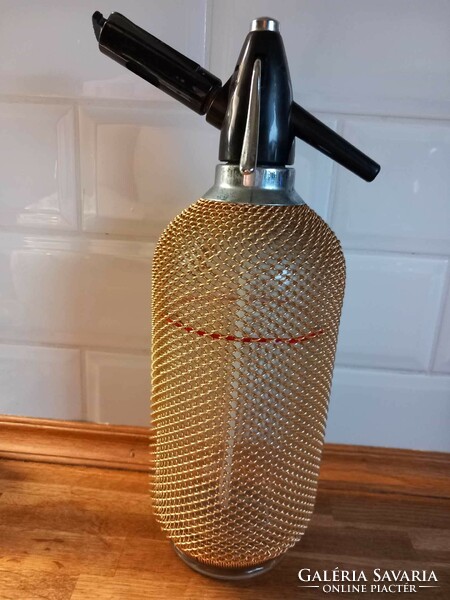 Retro steel mesh soda bottle