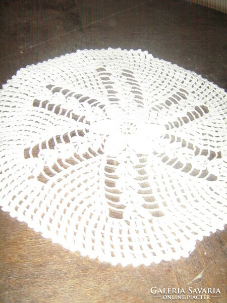 Beautiful handmade crochet on white tablecloth