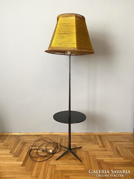 Wrought iron floor lamp with round shelf holder with yellow textile shade 149 cm