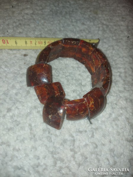 Amber-like bracelet with torn rubber, to be re-stringed
