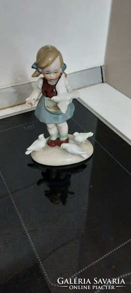 German porcelain little girl with a bird