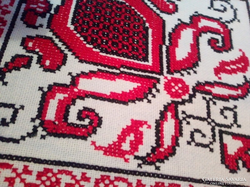 Beautiful antique cross-stitch tablecloth.
