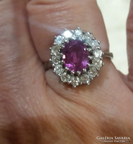 Gold ring with 0.70 Ct diamond and pink tourmaline. With certificate
