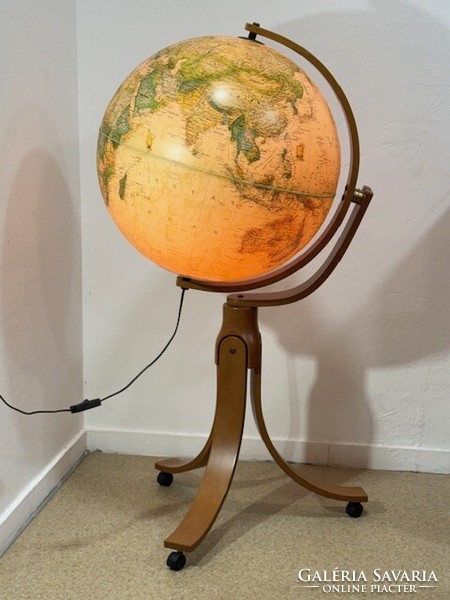 Huge Italian illuminated globe on rolling legs
