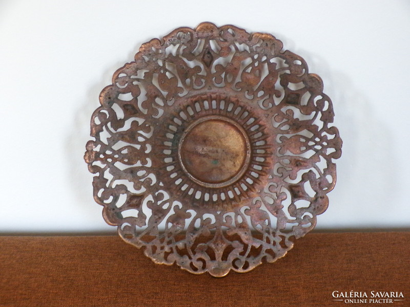 A beautiful openwork bronzed metal wall decoration / wall plate