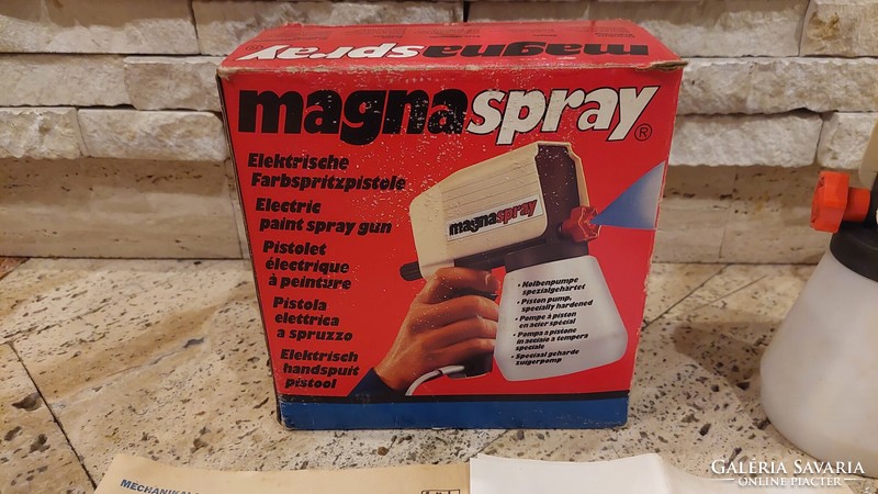 Mechanical works with magana spray can and papers