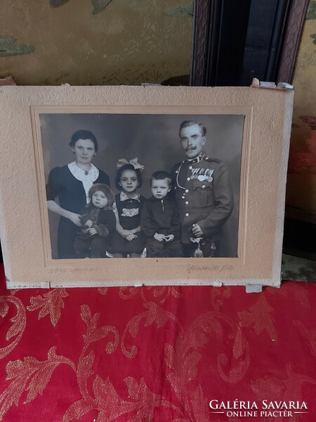 Old photograph of a military officer with his family