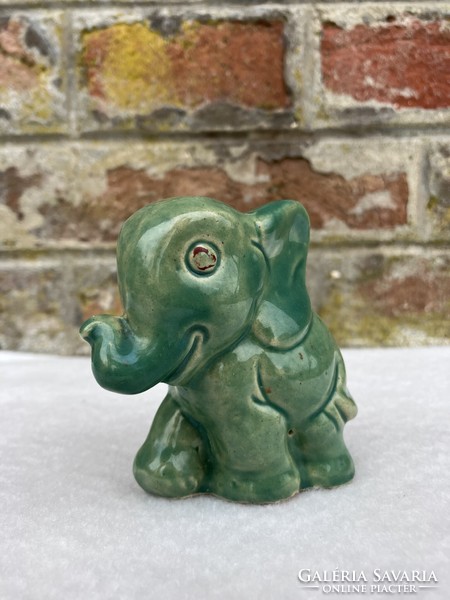 Green colored ceramic elephant figure