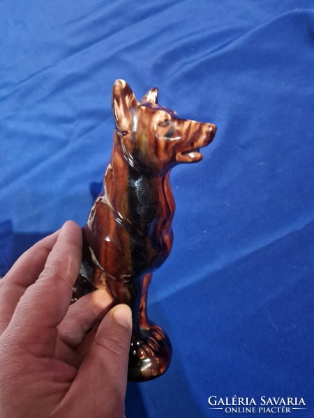 A brown-glazed ceramic figurine of a sitting dog?