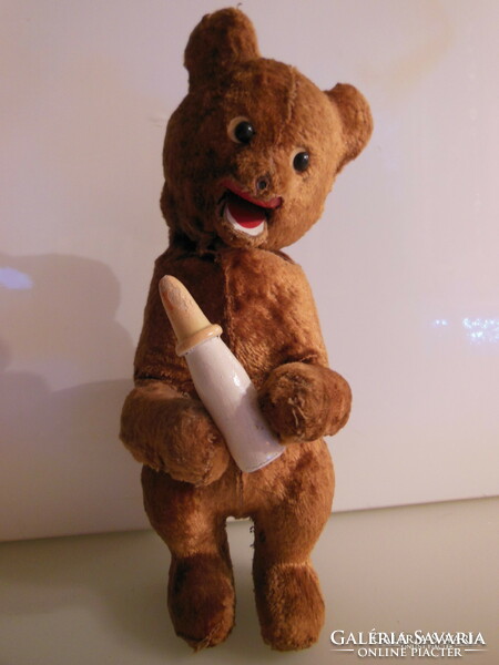 Teddy bear - drinks from a baby bottle - dances - 24 x 15 x 8 cm - nice condition - German - exclusive