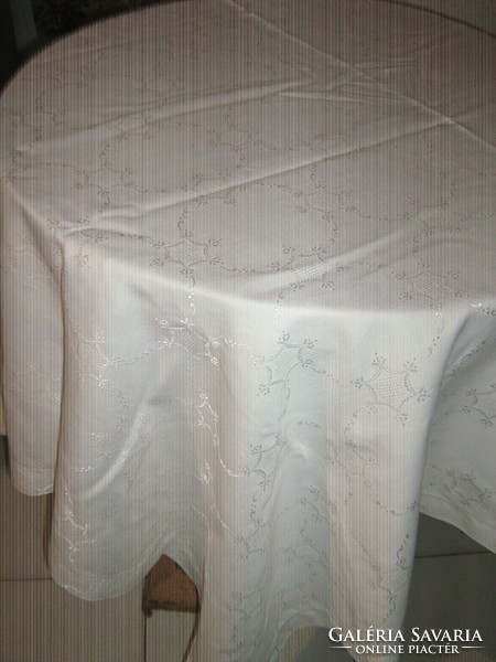 Beautiful pale cream-colored elegant Toledo damask tablecloth