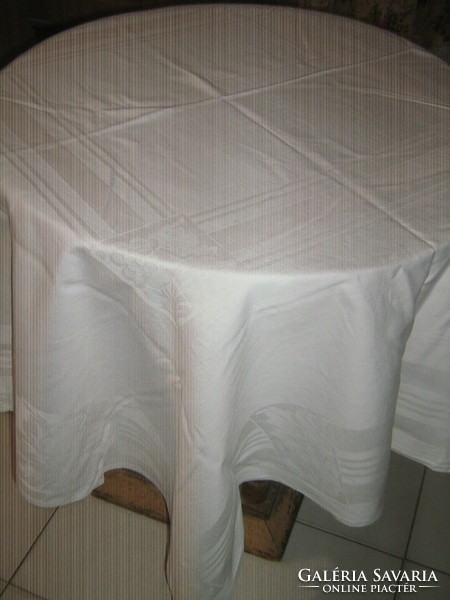 Beautiful damask tablecloth with a white rose pattern