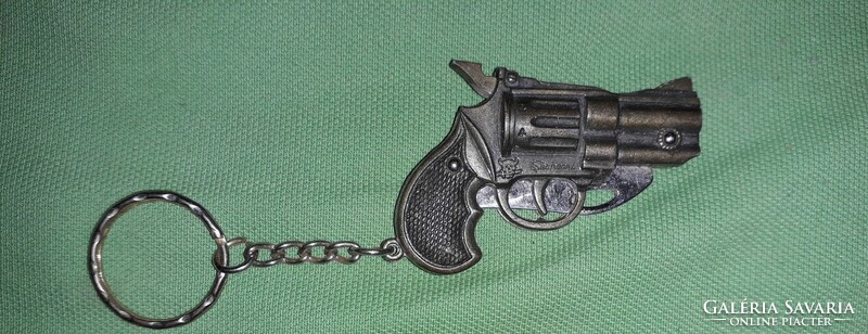 Régi rézszínű pisztoly alakú kulcstartó acélpengés bicska nagyon szép állapotban a képek szerint