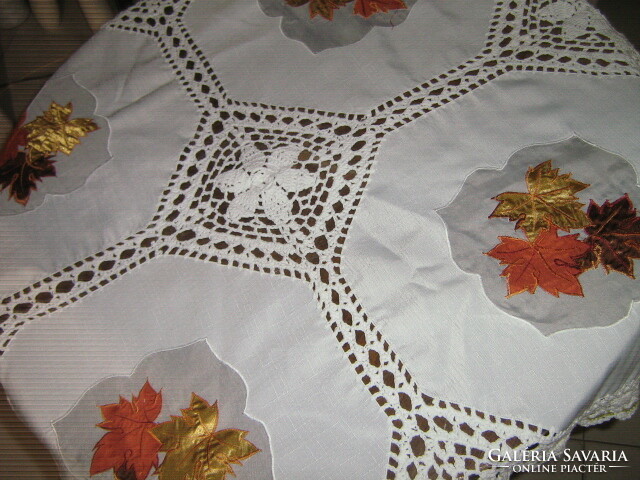 Beautiful hand-crocheted organza inlay with sewn leaf pattern tablecloth