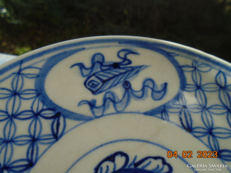Antique hand-painted cobalt blue Chinese plate with calligraphic and geometric patterns