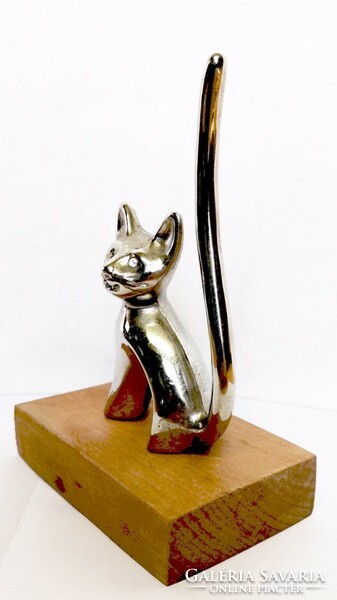 Art deco cat with crystal eyes on a wooden plinth. Modern sculpture