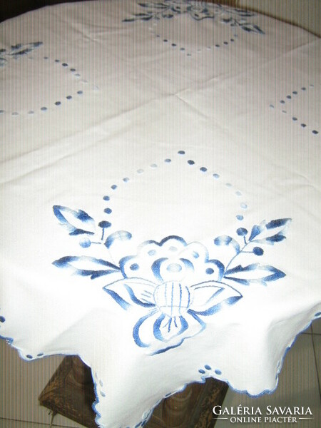 Beautiful hand embroidered tablecloth with blue floral sling edges