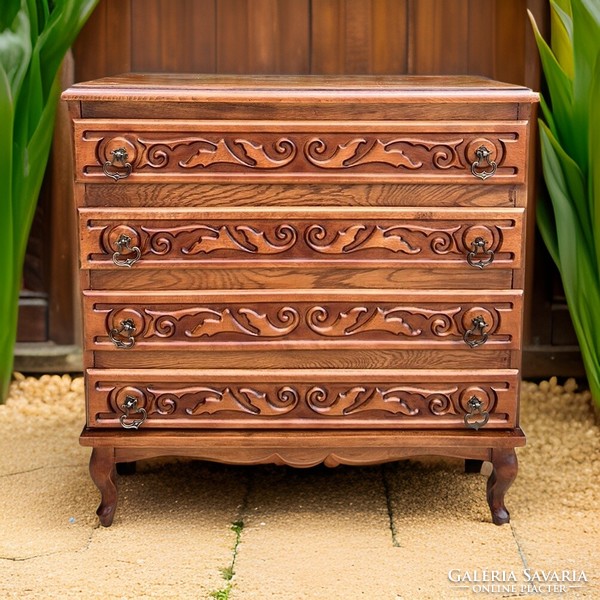 Neo-baroque chest of drawers with four drawers