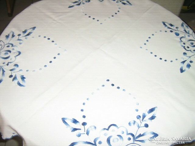 Beautiful hand embroidered tablecloth with blue floral sling edges