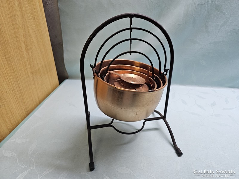 Copper kettle set on a stand