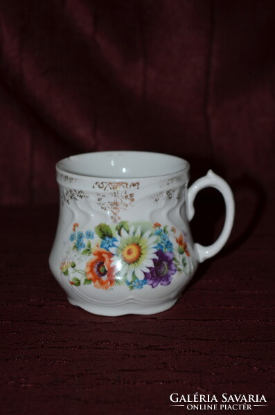 Old flower mug