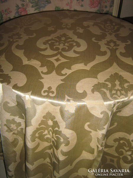 Beautiful and elegant old gold baroque patterned tablecloth