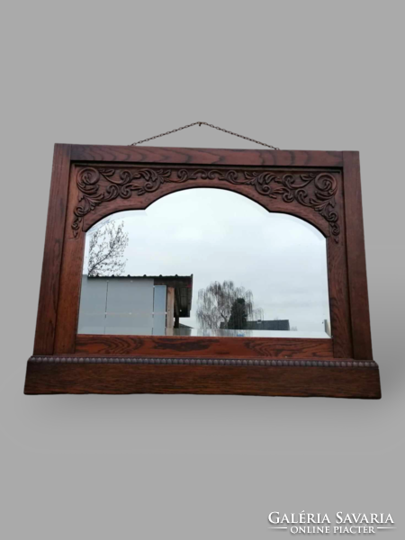 Carved wooden mirror