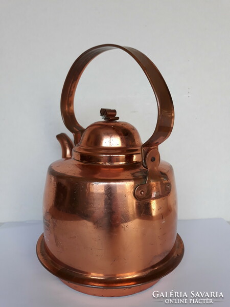 Antique copper teapot with patina