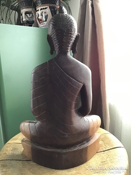 Hand carved wooden Buddha statue