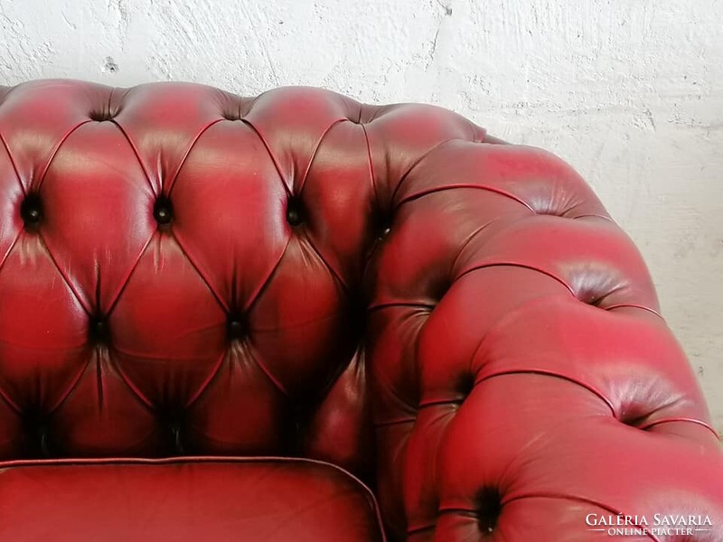 Chesterfield sofa with real cowhide upholstery