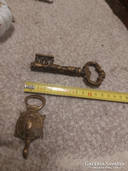 Old copper corkscrew with key shape, iron spiral and turtle bottle opener, bronzed iron