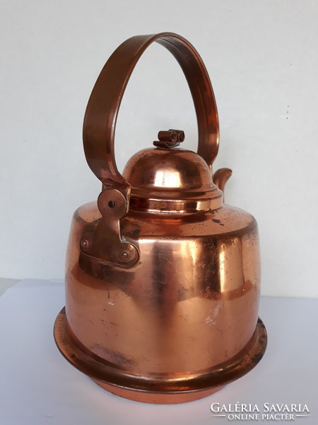 Antique copper teapot with patina