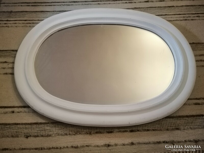 Huge oval mirror, 120 x 86 cm.