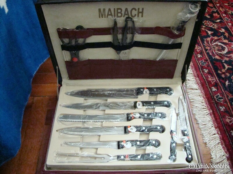 24 Partial maibach knife and cutlery set in new suitcase