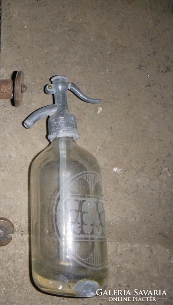 Old soda bottle marked máv, identical head