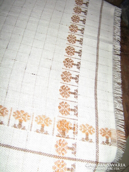 Elegant woven tablecloth with a beautiful fringed edge