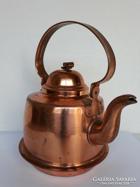 Antique copper teapot with patina
