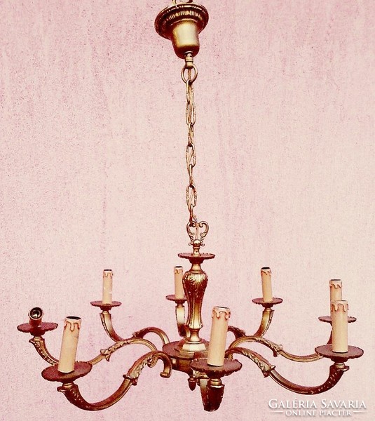 Antique bronze chandelier. Solid heavy piece with eight-ring candle burner