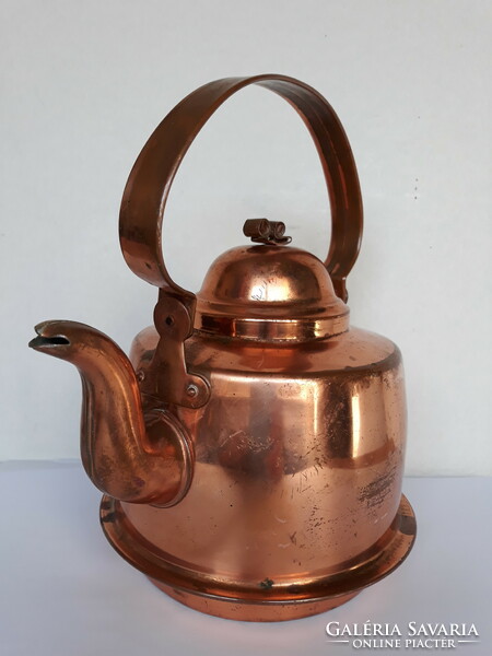 Antique copper teapot with patina