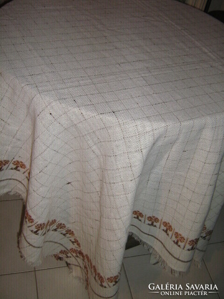Elegant woven tablecloth with a beautiful fringed edge