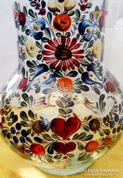 Antique glasswork artefact. A broken wine jug with richly painted bubble inclusions