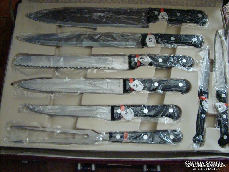 24 Partial maibach knife and cutlery set in new suitcase