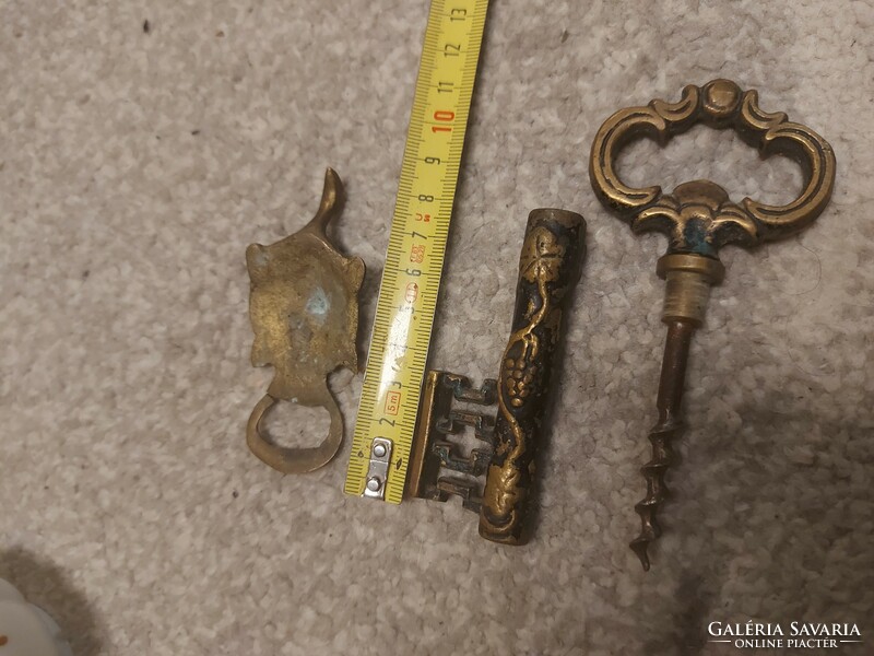 Old copper corkscrew with key shape, iron spiral and turtle bottle opener, bronzed iron