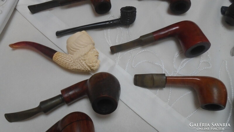 A collection of old pipes and the related tools together