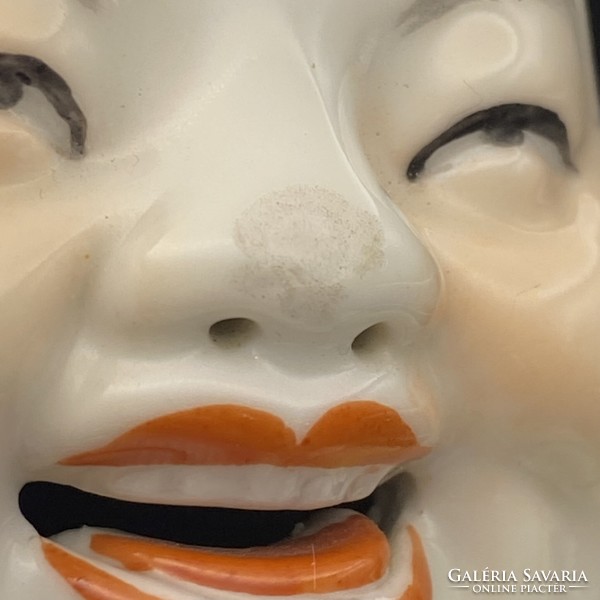 Porcelain laughing buddha