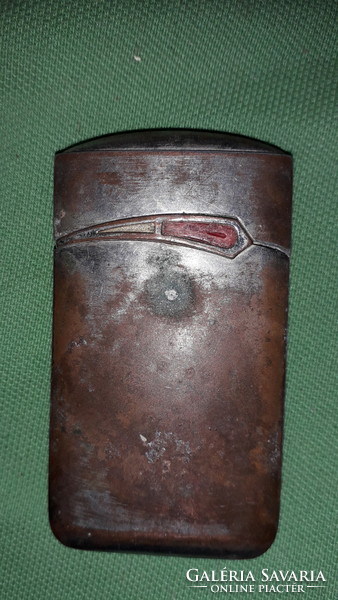 Old red stone inlaid metal casing storm lighter lighter as shown in the pictures