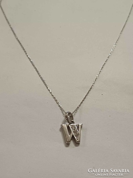 Thin silver chain with pendant