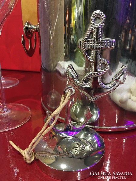 Nautical yacht equipment - a bottle of wine or an ice bucket for a champagne cooler with an anchor decoration
