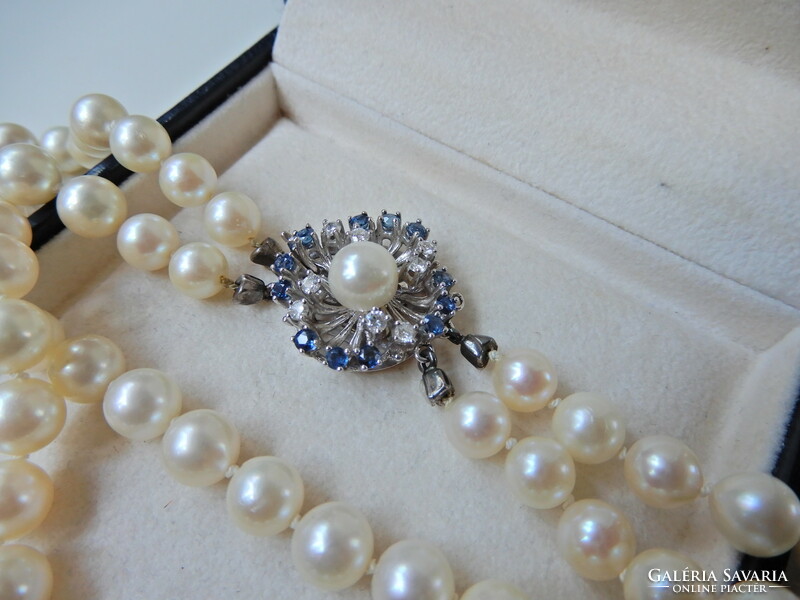 Two rows of genuine Akoya pearls with white gold clasp, sapphire stones and diamonds