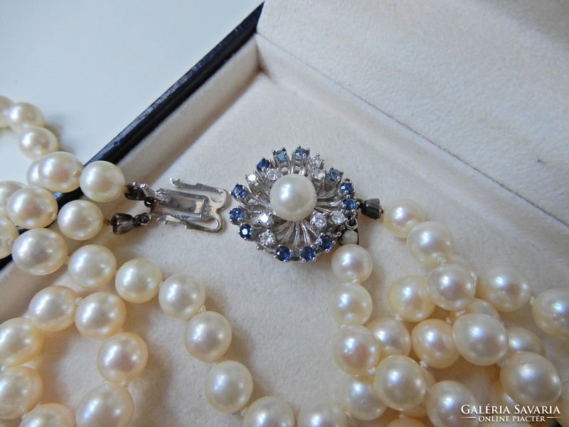 Two rows of genuine Akoya pearls with white gold clasp, sapphire stones and diamonds